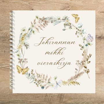 MEIDÄN MÖKIN VIERASKIRJA OMALLA TEKSTILLÄ kukkaseppele Decopaja