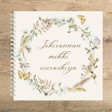MEIDÄN MÖKIN VIERASKIRJA OMALLA TEKSTILLÄ kukkaseppele Decopaja