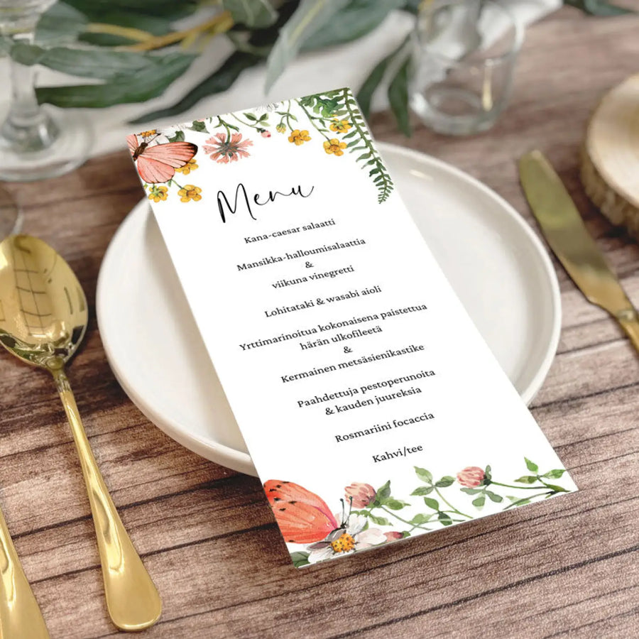 Menukortit ja hääohjelma niittykukkia Decopaja kattaukseen
