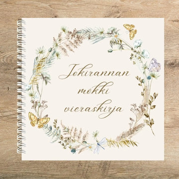 Mökin vieraskirja omalla tekstillä kukkaseppele Decopaja