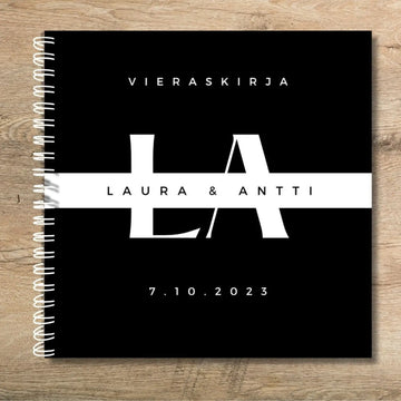 Vieraskirja häihin minimalistinen nimikirjaimet Decopaja musta tausta ja valkoinen teksti