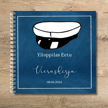 VIERASKIRJA YLIOPPILASJUHLIIN ylioppilaslakki ja sininen tausta Decopaja