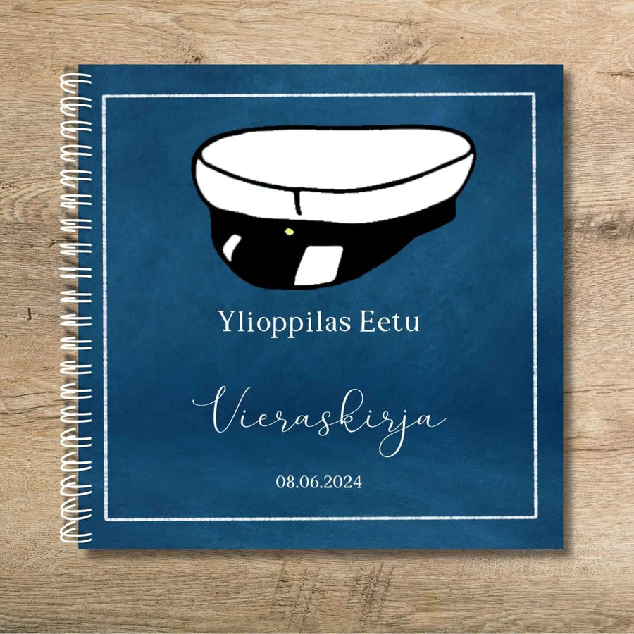 VIERASKIRJA YLIOPPILASJUHLIIN ylioppilaslakki ja sininen tausta Decopaja